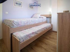 Ένα ή περισσότερα κρεβάτια σε δωμάτιο στο Apartamento Aránzazu playa