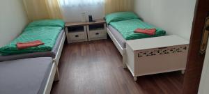 Łóżko lub łóżka w pokoju w obiekcie Ubytování pod Pálavou