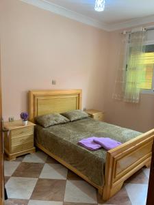Postel nebo postele na pokoji v ubytování Appartement Mus saidia 1