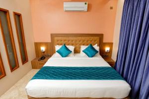 Postel nebo postele na pokoji v ubytování HOTEL TAIKA