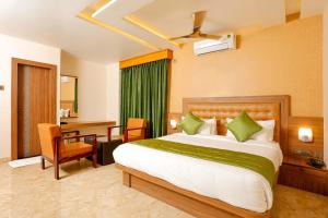 Postel nebo postele na pokoji v ubytování HOTEL TAIKA