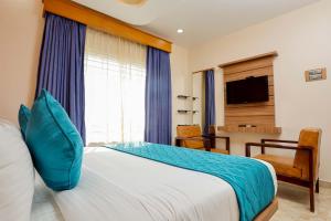 TV a/nebo společenská místnost v ubytování HOTEL TAIKA