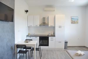 Fotografia z galérie ubytovania Studio apartman Gili v destinácii Kaštela