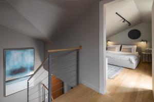 Posteľ alebo postele v izbe v ubytovaní Apartman Colmo s hidromasažnom kadom