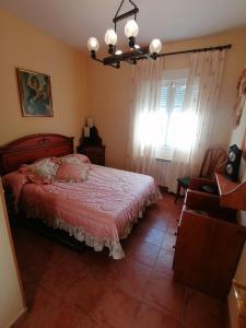 En eller flere senge i et værelse på LOS PRUNOS