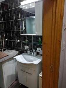 Ένα μπάνιο στο Cabana Aura Campulung Moldovenesc