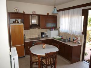 A kitchen or kitchenette at Villa Helidoni