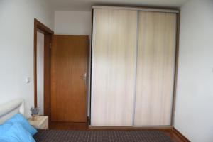 Ένα ή περισσότερα κρεβάτια σε δωμάτιο στο Apartman Kentaur Vrnjačka Banja +7 φωτογραφίες
