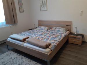 Posteľ alebo postele v izbe v ubytovaní Ferienwohnung Huber