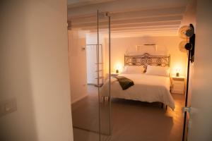 Llit o llits en una habitació de Casa Sant'Orsola - Appartamento nella città antica