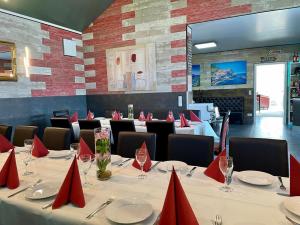 Restorāns vai citas vietas, kur ieturēt maltīti, naktsmītnē Hotel Cafe Gästehaus Stefanie