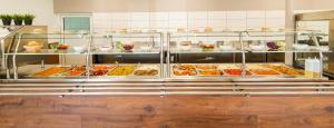 a buffet line with many different types of food at Industrial Belišće in Belišće