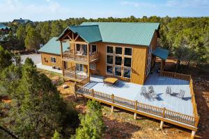 an overhead view of a house with a large deck at Zion Ponderosa Ranch Resort in Springdale