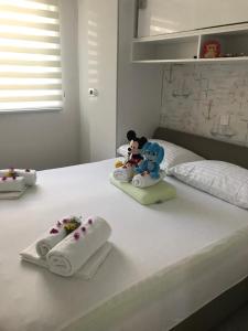 Postel nebo postele na pokoji v ubytování Mandy Apartman