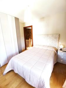 Postel nebo postele na pokoji v ubytování Casa Carmelo