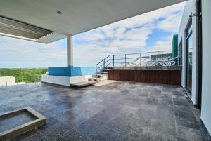 Mynd úr myndasafni af Modern Studio with Rooftop pool + 500MB Internet FAST SPEED í Tulum