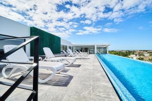 Mynd úr myndasafni af Modern Studio with Rooftop pool + 500MB Internet FAST SPEED í Tulum