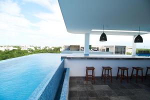 Mynd úr myndasafni af Modern Studio with Rooftop pool + 500MB Internet FAST SPEED í Tulum