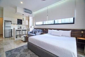 Mynd úr myndasafni af Modern Studio with Rooftop pool + 500MB Internet FAST SPEED í Tulum