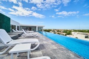 Mynd úr myndasafni af Modern Studio with Rooftop pool + 500MB Internet FAST SPEED í Tulum