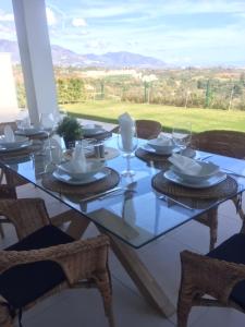 Gallery image of COSTA DEL SOL MIJAS GOLF FIRST LINE-NEAR MARBELLA - STUNNING VIEWS - GROUND FLOOR PENTHOUSE APPARTEMENT - 3 BEDROOMS - BIG TERRAS AND GARDEN 2- 6 persons ONE PRICE! - COMPLETELY FURNISHED AND EQUIPT FOR AN UNFORGETABLE HOLIDAY AND GOLF MATCHES PLEASURES in Mijas