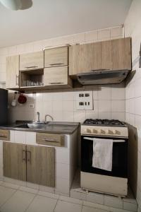 Кухня или мини-кухня в Acogedor Apartamento en el Norte 3 Habitaciones F14B
