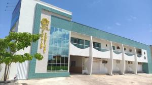 an exterior view of a building at Hotel Pousada Paraíso Tropical in Salinópolis