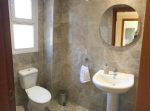 A bathroom at Manilva Townhouse with spectacular views of Gibraltar