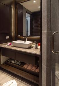Ванна кімната в The Pe La Resort, Phuket - SHA Extra Plus