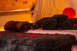 Posteľ alebo postele v izbe v ubytovaní glamping rustiko
