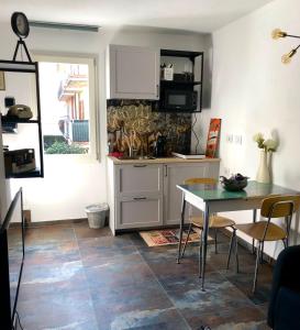 Кухня или мини-кухня в Gattaglio 22 Guest House
