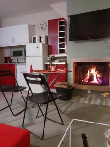 TV a/nebo společenská místnost v ubytování Sunset at Cape Sounio