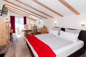 Ένα ή περισσότερα κρεβάτια σε δωμάτιο στο Hotel Garni Effland