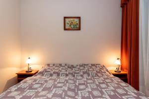 Postel nebo postele na pokoji v ubytování Canary Color Guesthouse