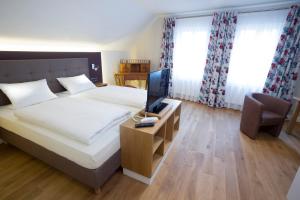 Postel nebo postele na pokoji v ubytování Genießerhotel Limbacher