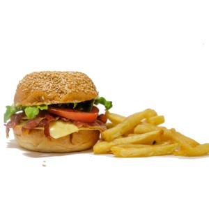a sandwich and french fries on a plate at Sweet Time Bungalows in Koh Rong Sanloem