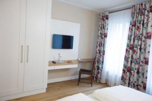 Postel nebo postele na pokoji v ubytování Genießerhotel Limbacher
