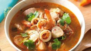 a bowl of soup with shrimp and other vegetables at Sweet Time Bungalows in Koh Rong Sanloem