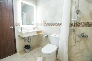 Koupelna v ubytování Oxville Hotel