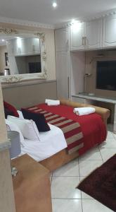 Ένα ή περισσότερα κρεβάτια σε δωμάτιο στο Romans Rest Guest House