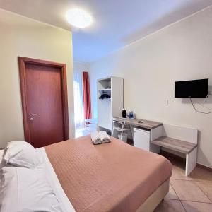 Postel nebo postele na pokoji v ubytování Kalaskiso'