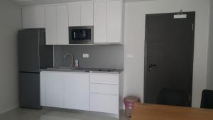 Kuchyň nebo kuchyňský kout v ubytování Bellissima Apartments