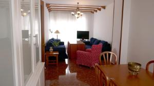 Televízia a/alebo spoločenská miestnosť v ubytovaní Casa Soleada en Calle Tranquila
