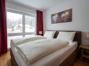 Posteľ alebo postele v izbe v ubytovaní Kitzbühel alpine lodge with private infrared sauna