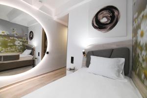 Ένα ή περισσότερα κρεβάτια σε δωμάτιο στο Medical and Spa Centre Merkur