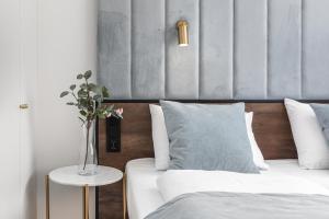 Łóżko lub łóżka w pokoju w obiekcie Apart Park - Stylowe Studio 3 min od PLAŻY by Noclegi Renters