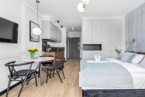 Łóżko lub łóżka w pokoju w obiekcie Apart Park - Stylowe Studio 3 min od PLAŻY by Noclegi Renters