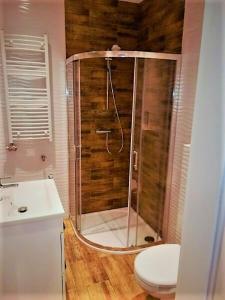 Kúpeľňa v ubytovaní Uroczy Loft