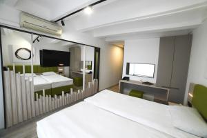 Ένα ή περισσότερα κρεβάτια σε δωμάτιο στο Medical and Spa Centre Merkur