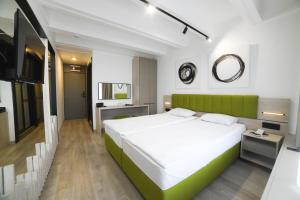 Ένα ή περισσότερα κρεβάτια σε δωμάτιο στο Medical and Spa Centre Merkur
